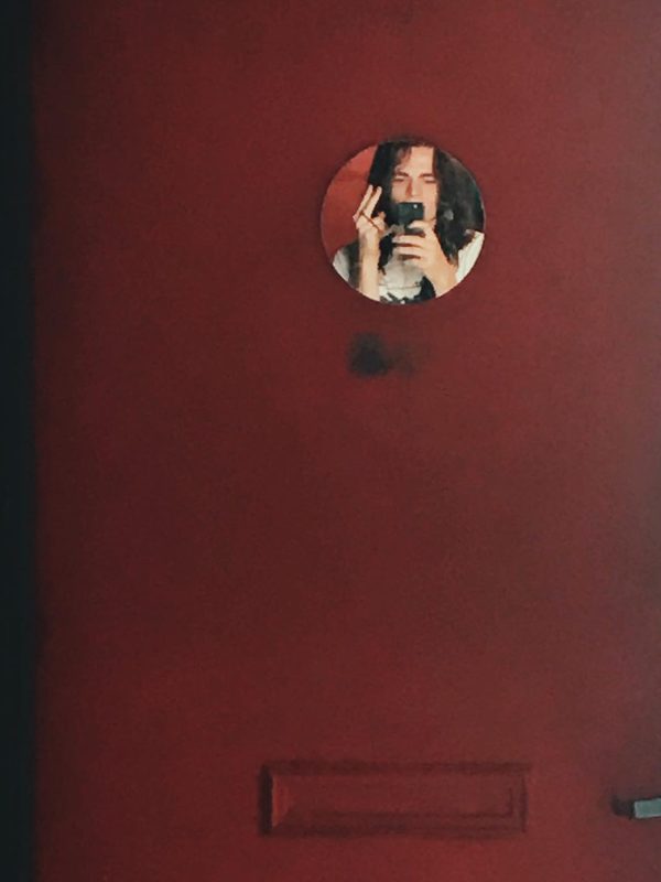 Bonus points if you know where this mirror and red door is